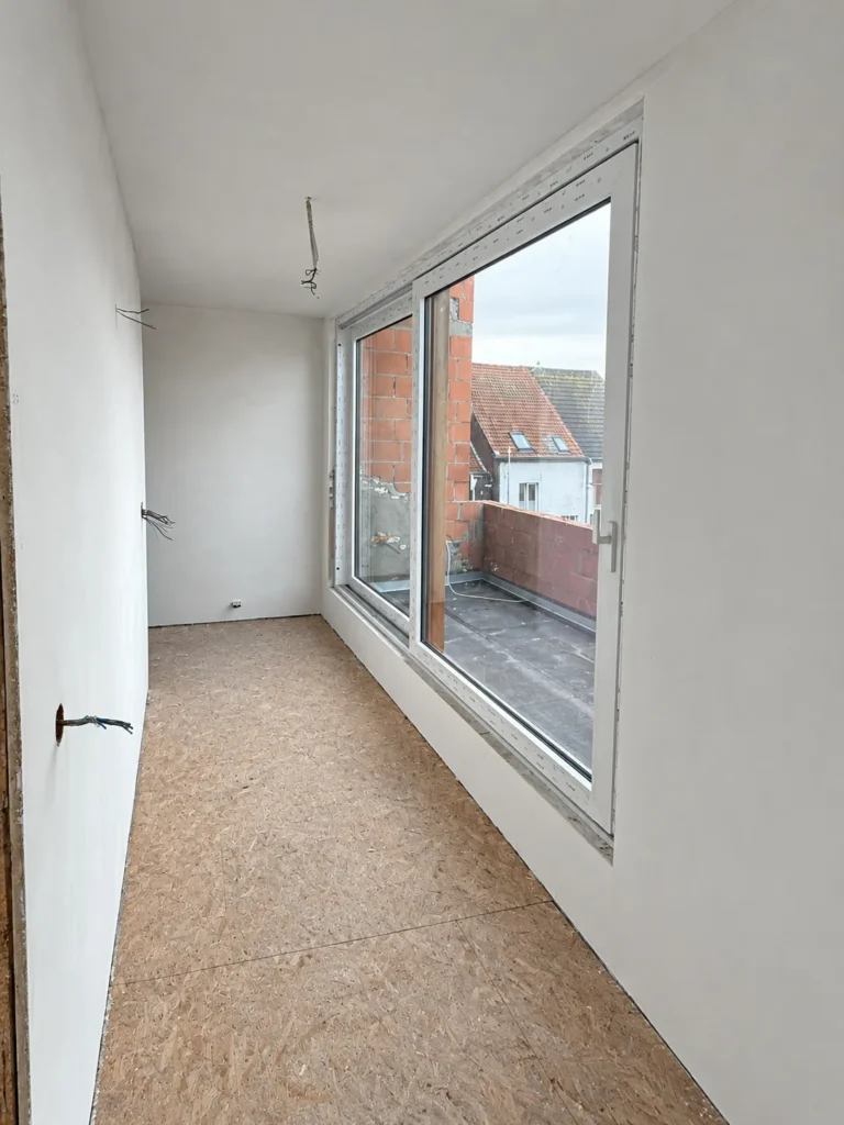 Totaalrenovatie rijwoning Gent: het grote raam naar het dakterras